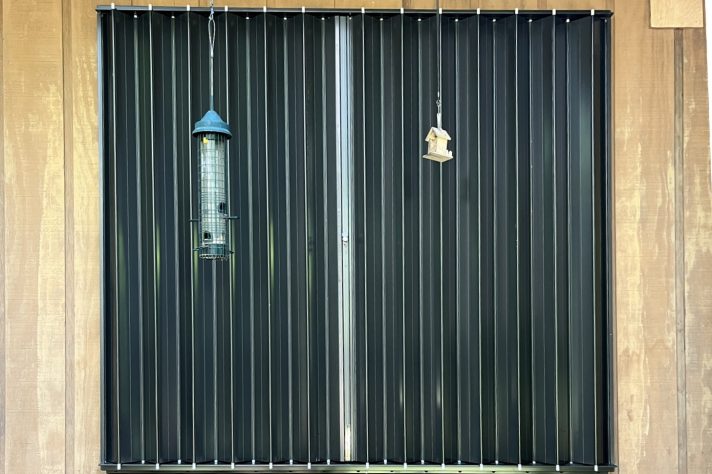 Bertha Accordion - Bronze - Standard Lock Accordion Shutter - Bronze - Closed